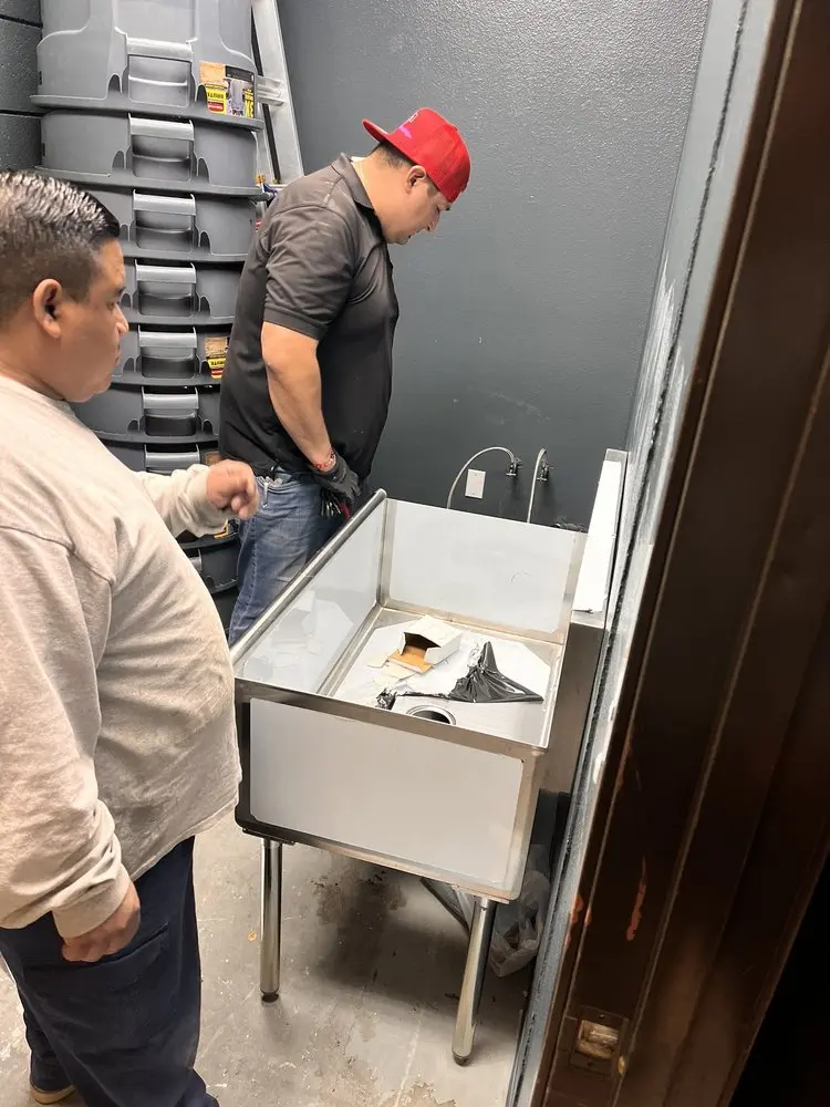 Commercial plumbing and sink installation in Center